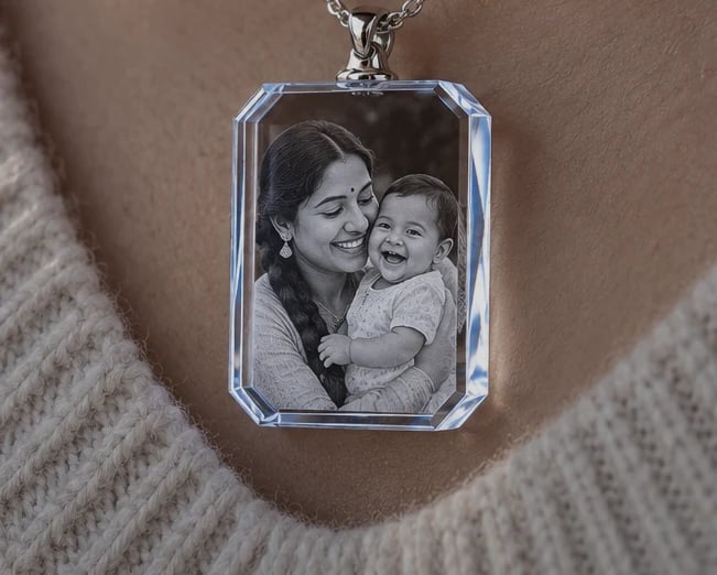 Rectangle crystal necklace with a mother and baby worn over a knit sweater